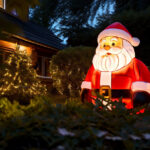 Top 5 Inflatable Light-Up Decorations for Festivals and Parties 4 small light up inflatable santa claus in the garden at night 1